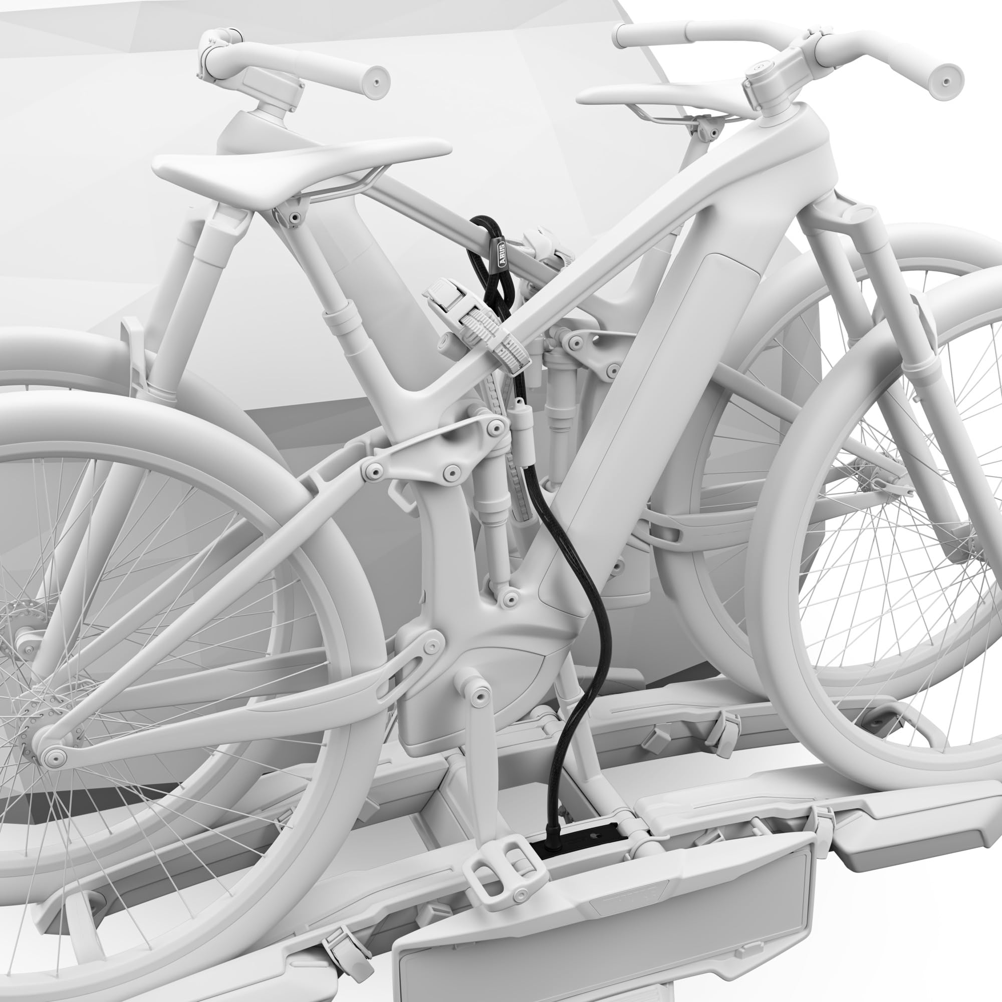 Deux VTT blancs sur un porte-vélos, sécurisés ensemble par un antivol noir.