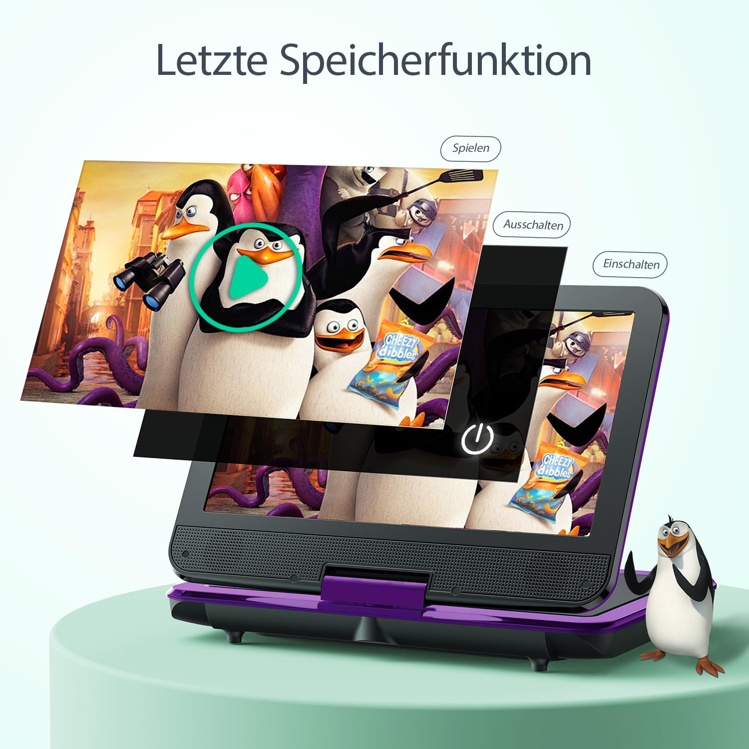 Ein portabler DVD-Player mit Pinguin-Motiven und Bedienelementen steht auf einem Tisch.