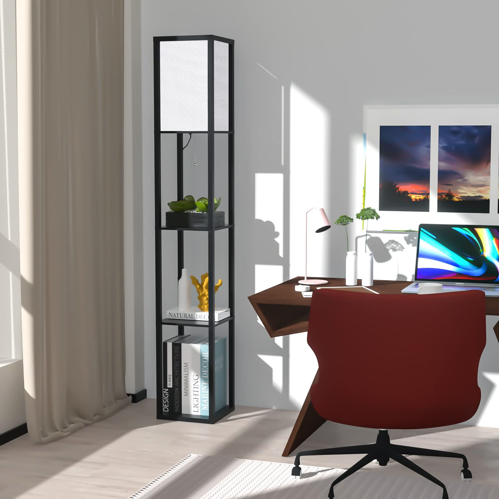 Moderna zona scrivania con sedia rossa, lampada a scaffale alta, laptop e quadro a parete.