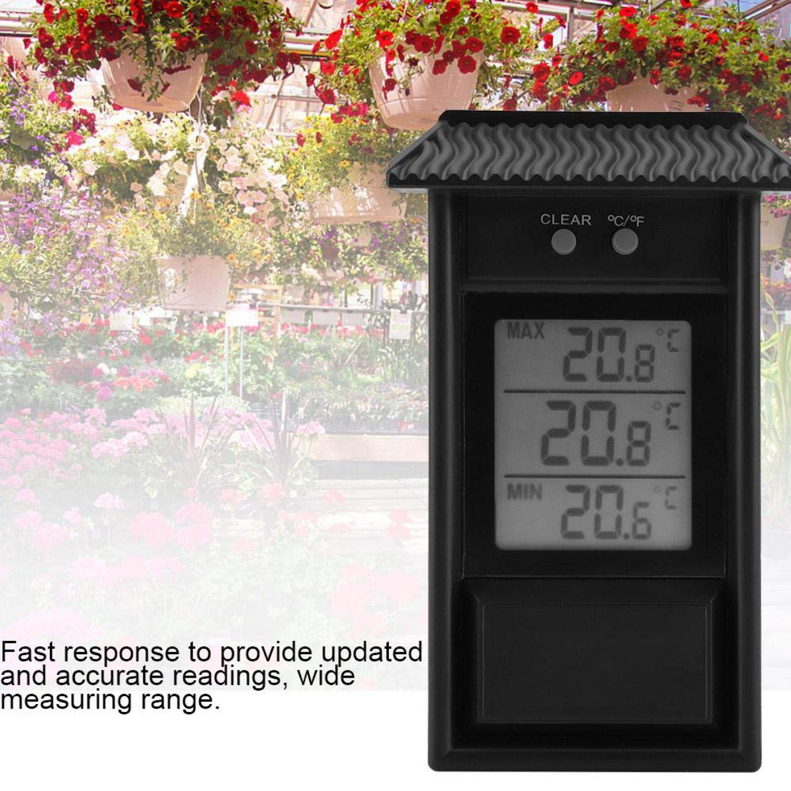 Ein digitales Gewächshausthermometer vor einem Hintergrund aus bunten Blumen.