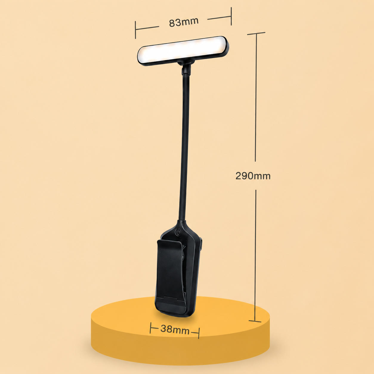 Schwarze LED-Klemmleuchte mit Maßen: 83mm Lampenkopf, 290mm Höhe, auf gelbem Sockel.
