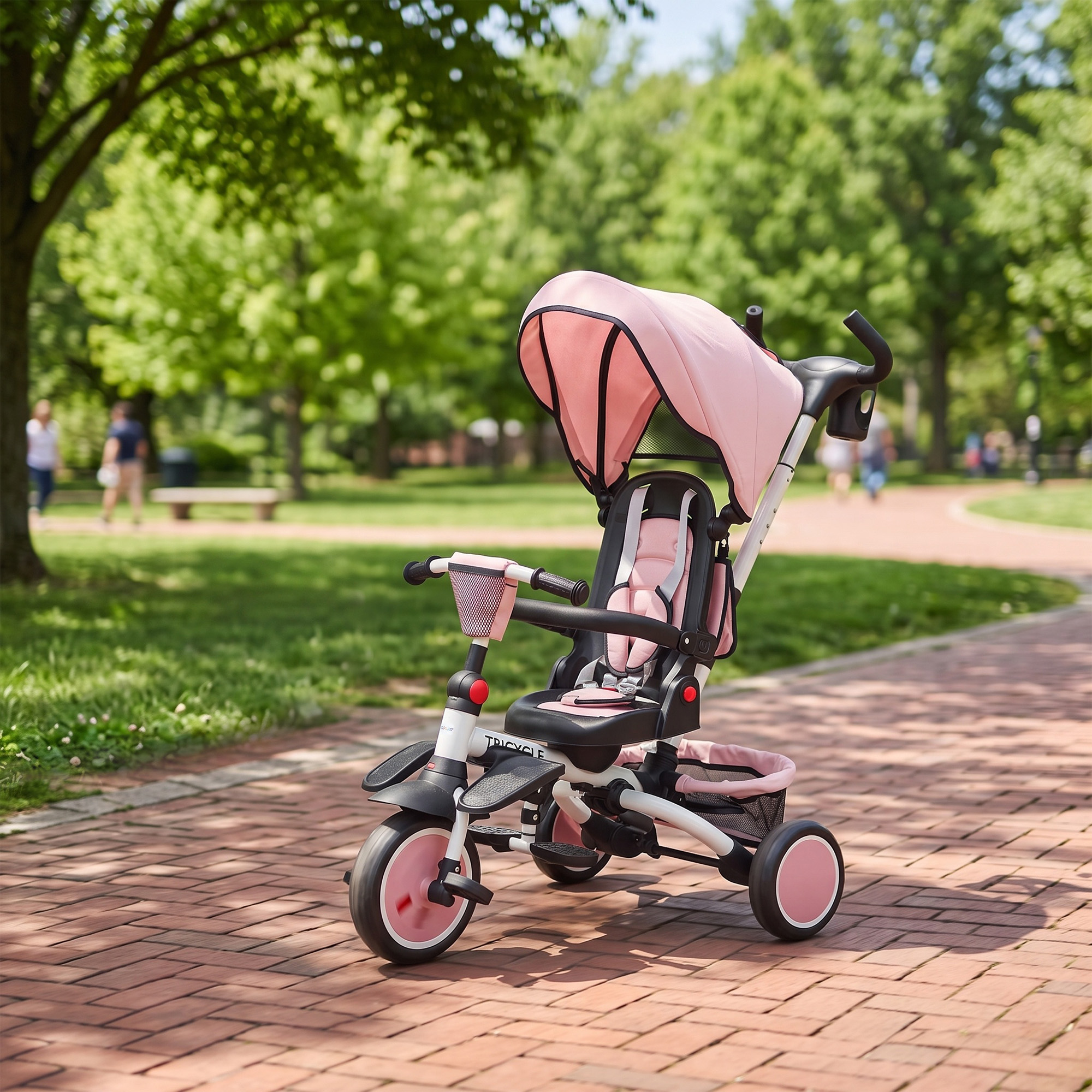 Un triciclo infantil rosa y negro se encuentra en un camino de ladrillos en un parque verde.