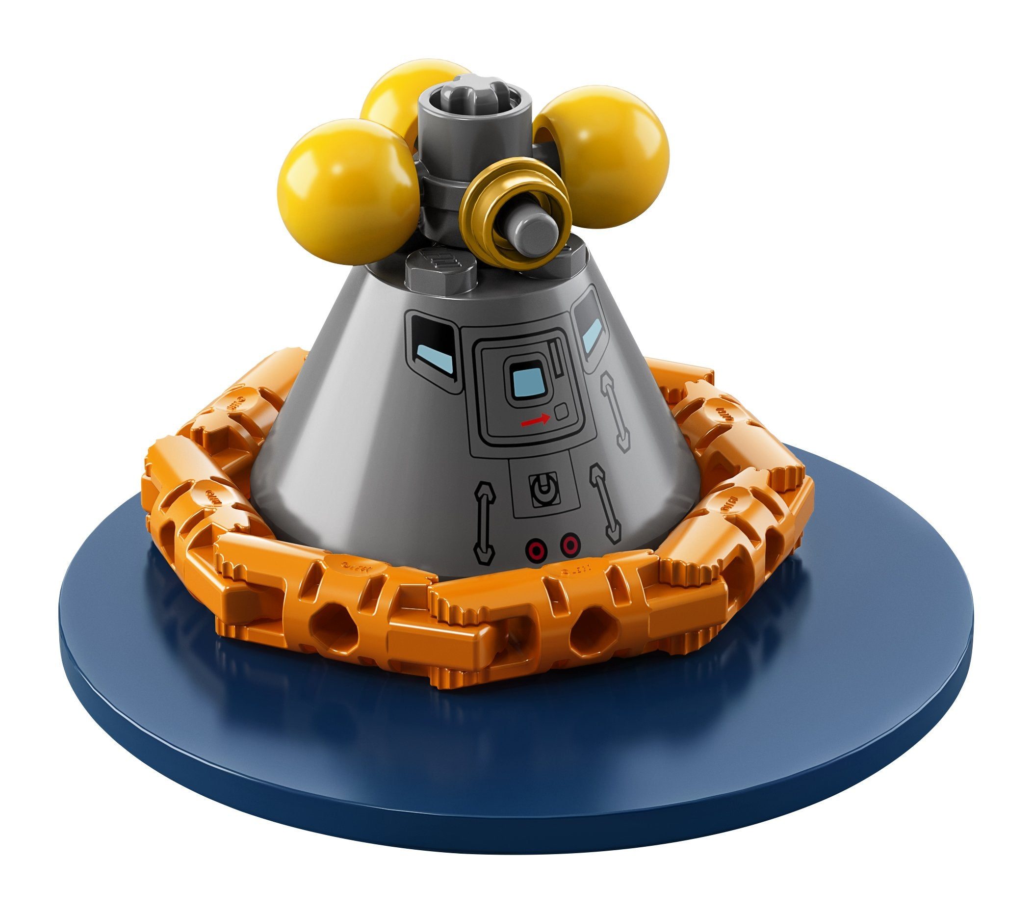 Un modèle de capsule spatiale LEGO avec des sphères jaunes sur le dessus, une base orange, sur un socle bleu.