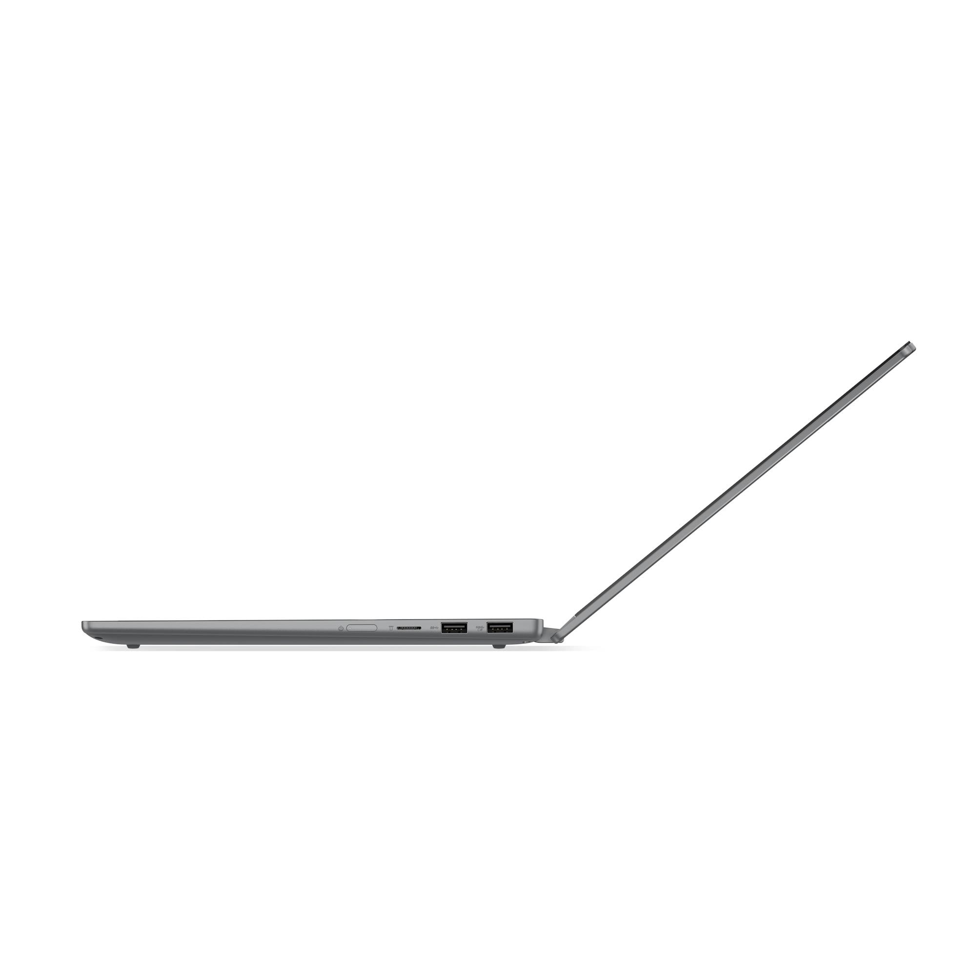 Vista laterale di un laptop sottile e grigio con schermo aperto e porte USB visibili su sfondo bianco.