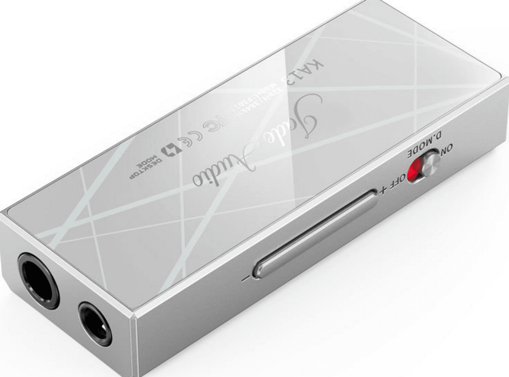 Srebrny wzmacniacz słuchawkowy FiiO Jade Audio z dwoma gniazdami audio i przyciskami.