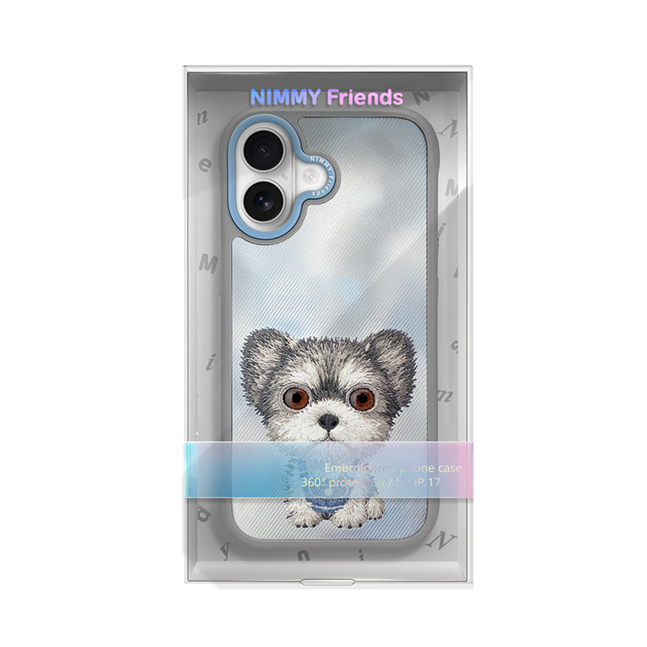 Una funda de móvil en una caja con un gráfico de perro bordado y dos lentes de cámara arriba a la izquierda.