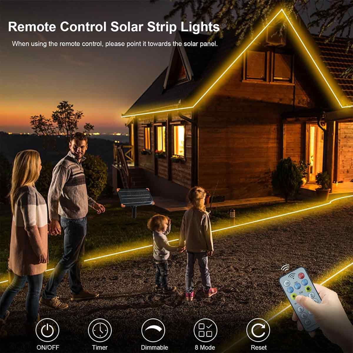 Eine vierköpfige Familie geht an einem Haus vorbei, das mit warmen gelben Solar-Lichtleisten beleuchtet wird.
