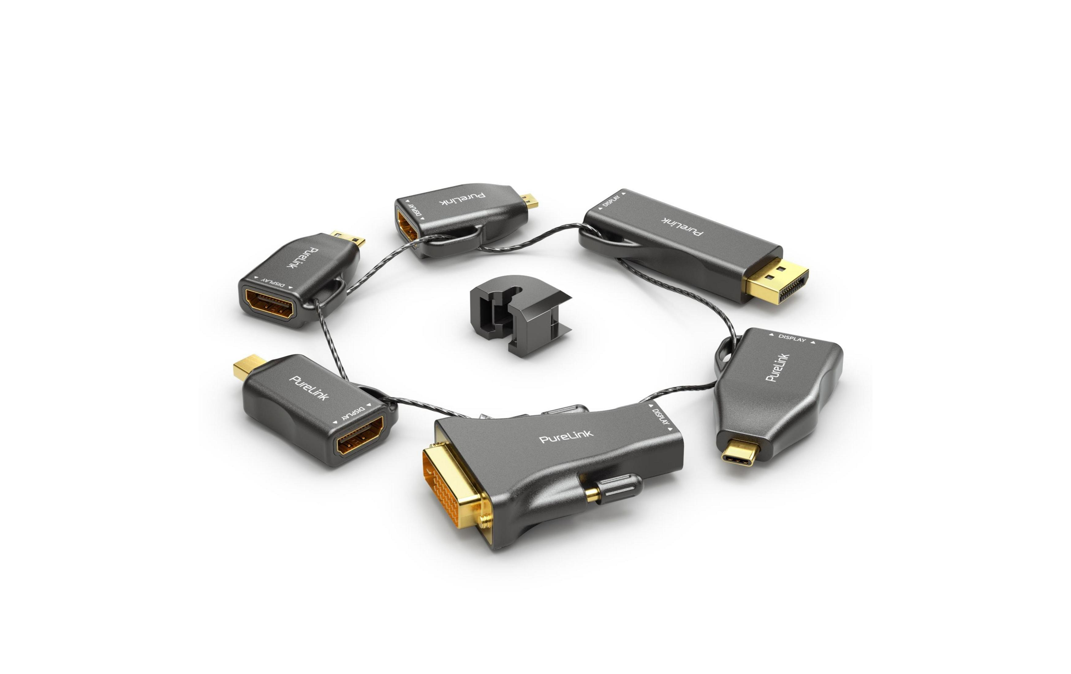Ein Kreis aus sechs PureLink-Videoadaptern, verbunden durch ein dünnes Kabel, mit einem kleinen Hal Clips in der Mitte.