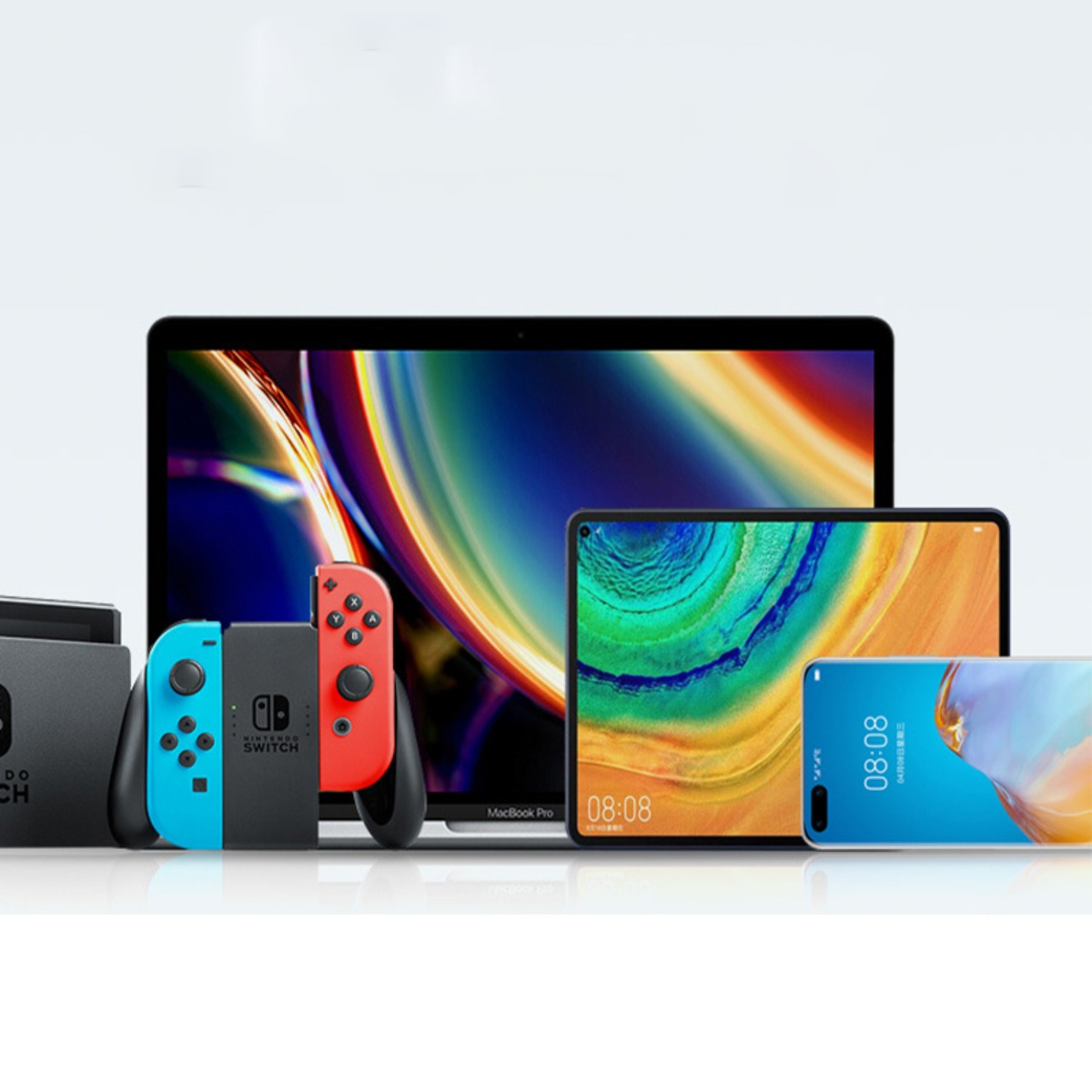 Ein Laptop, Tablet, Smartphone und eine Spielkonsole auf weißer Oberfläche.