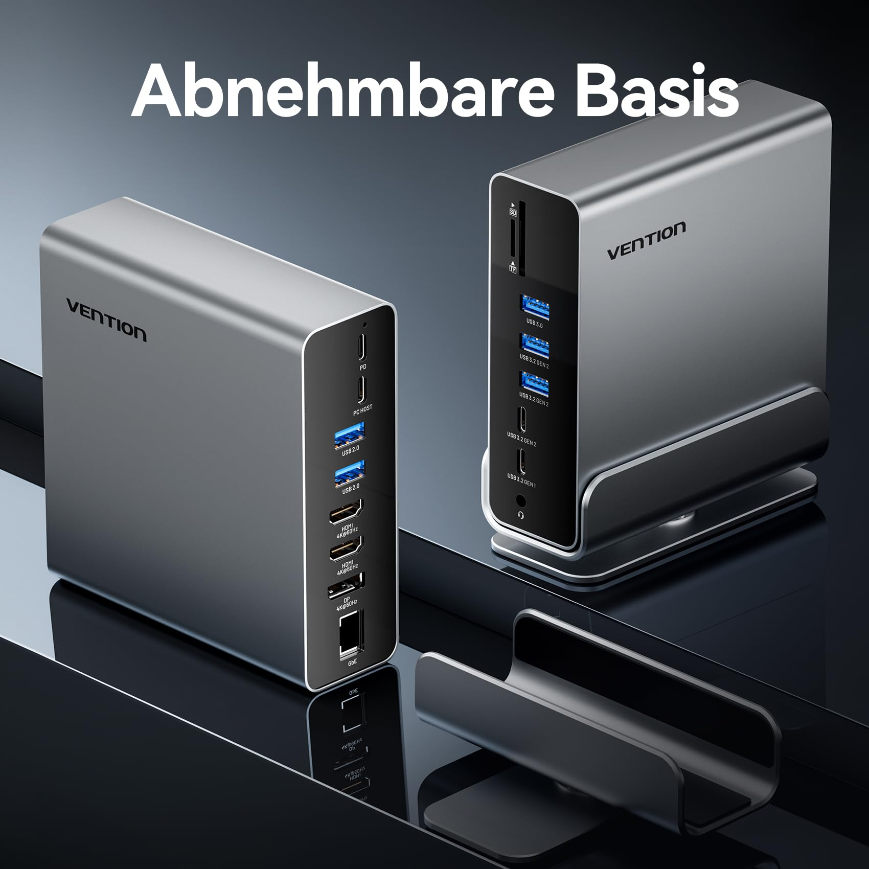 Due docking station Vention argentate, una con base rimovibile, su superficie scura riflettente.