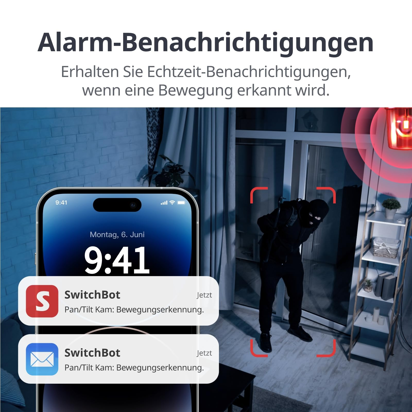 Smartphone mostra un avviso di movimento mentre un ladro è visibile sullo sfondo.