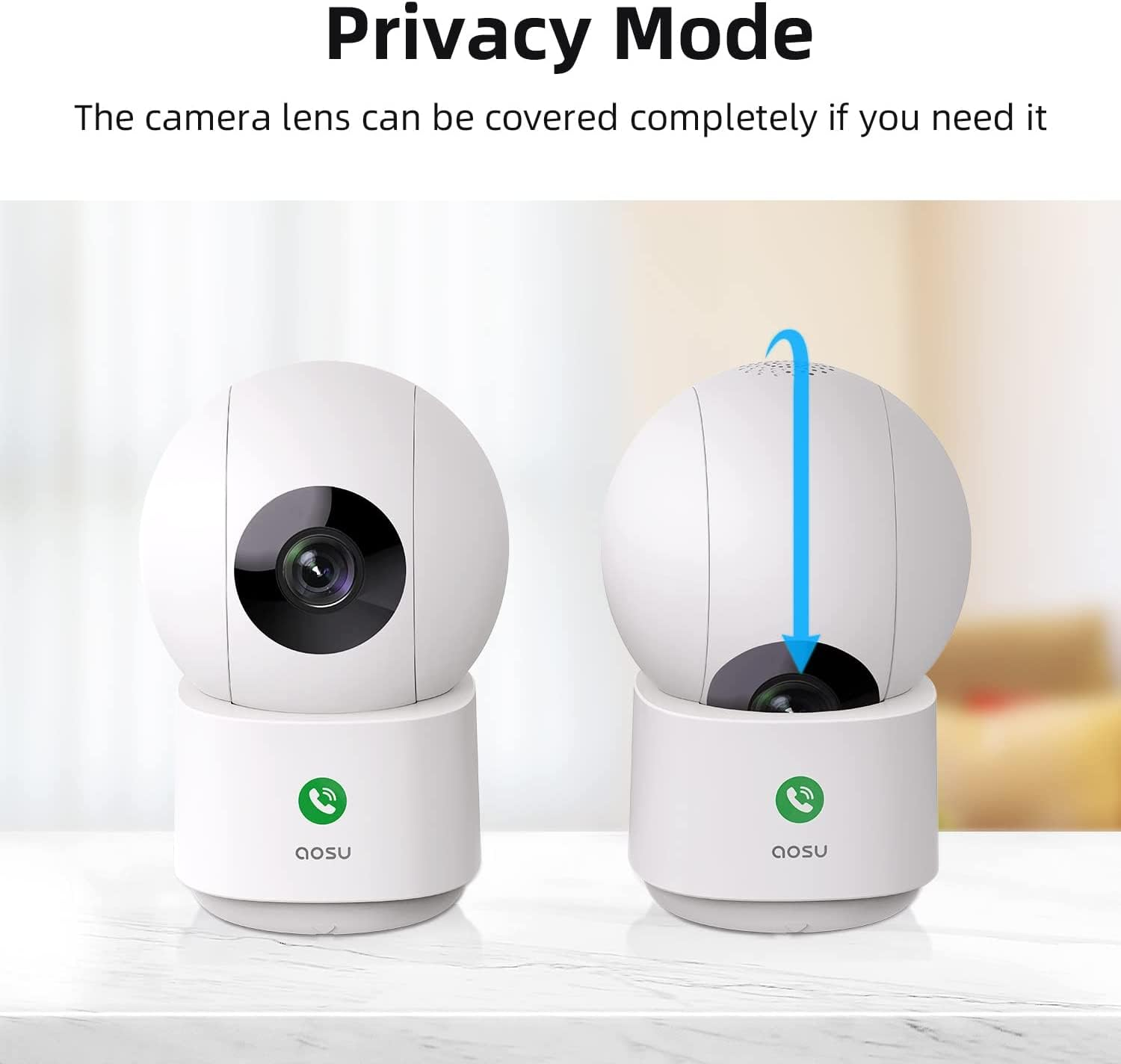 Due telecamere di sicurezza bianche su un tavolo, una con l'obiettivo coperto in modalità privacy.