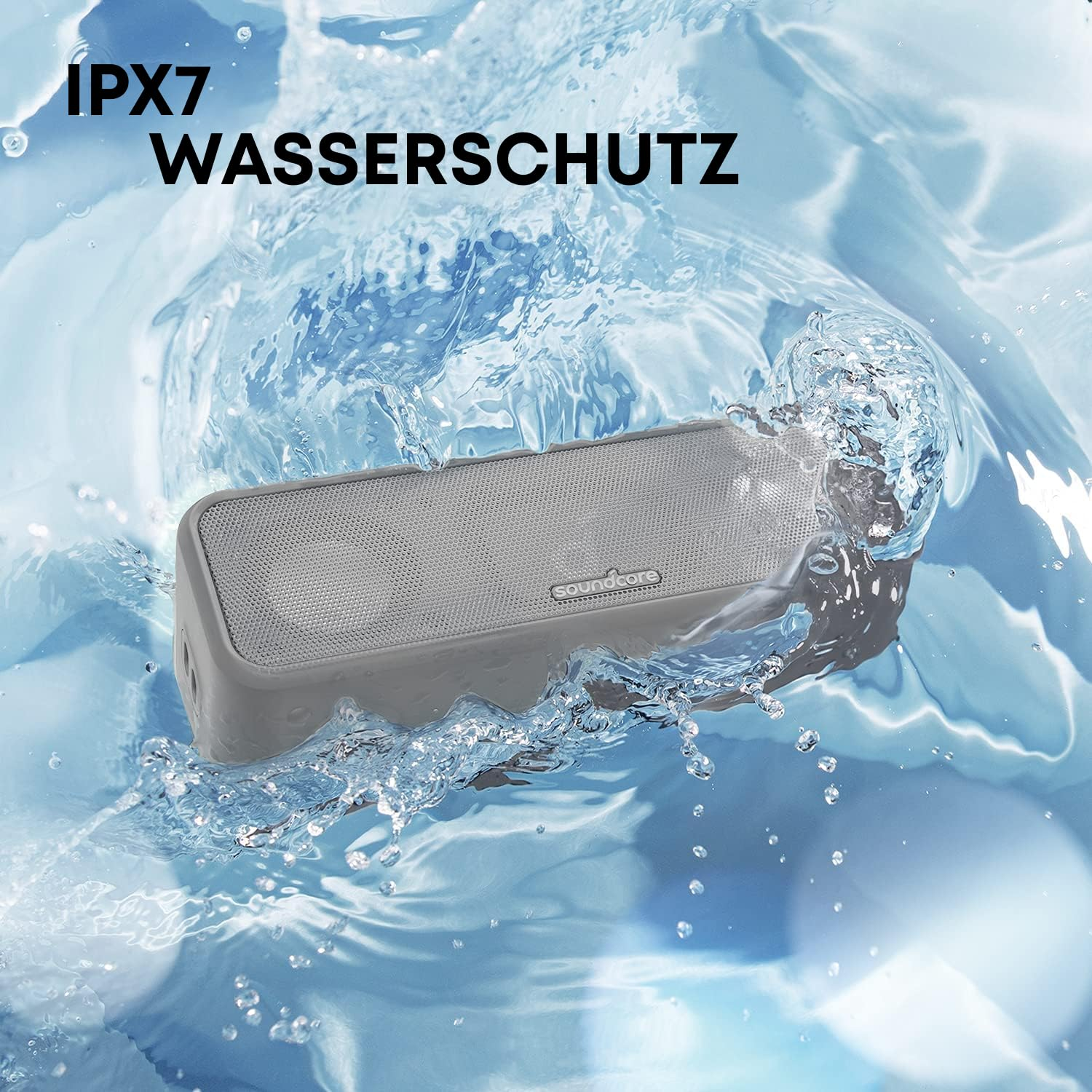 Un altoparlante grigio Soundcore è circondato da acqua limpida che spruzza, con testo IPX7 Wasserschutz.