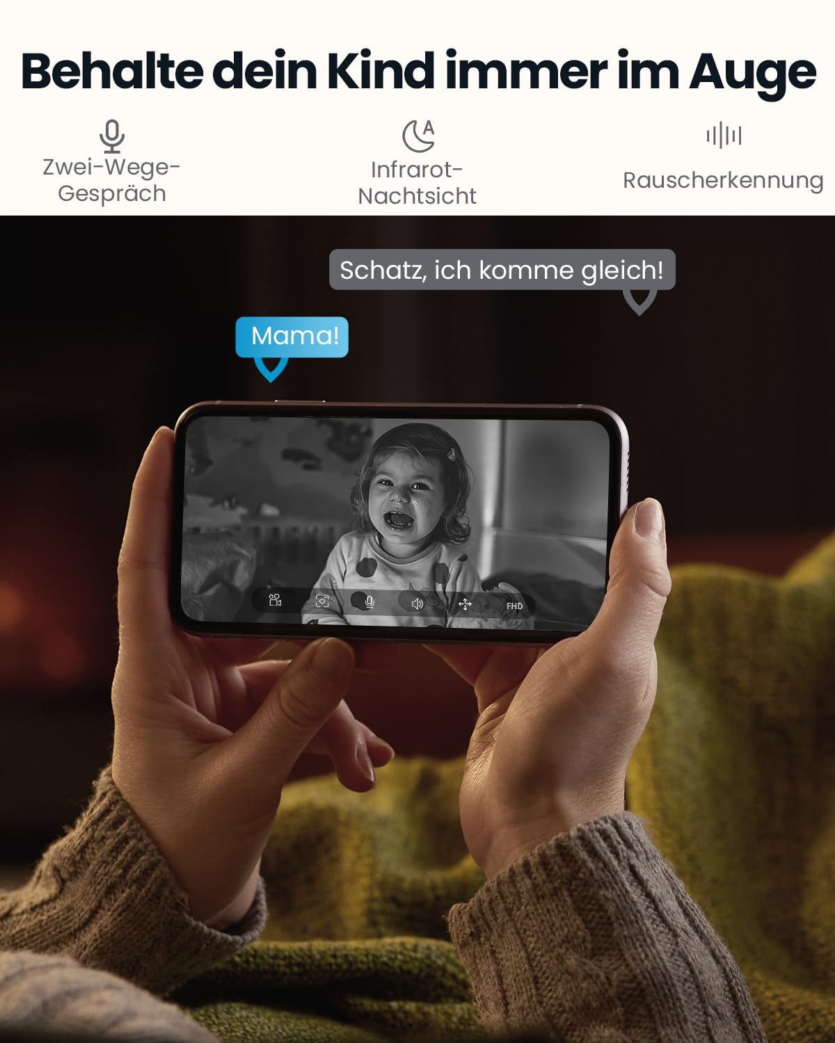 Mains tenant un smartphone affichant un bébé qui pleure, avec des icônes de moniteur pour bébé.