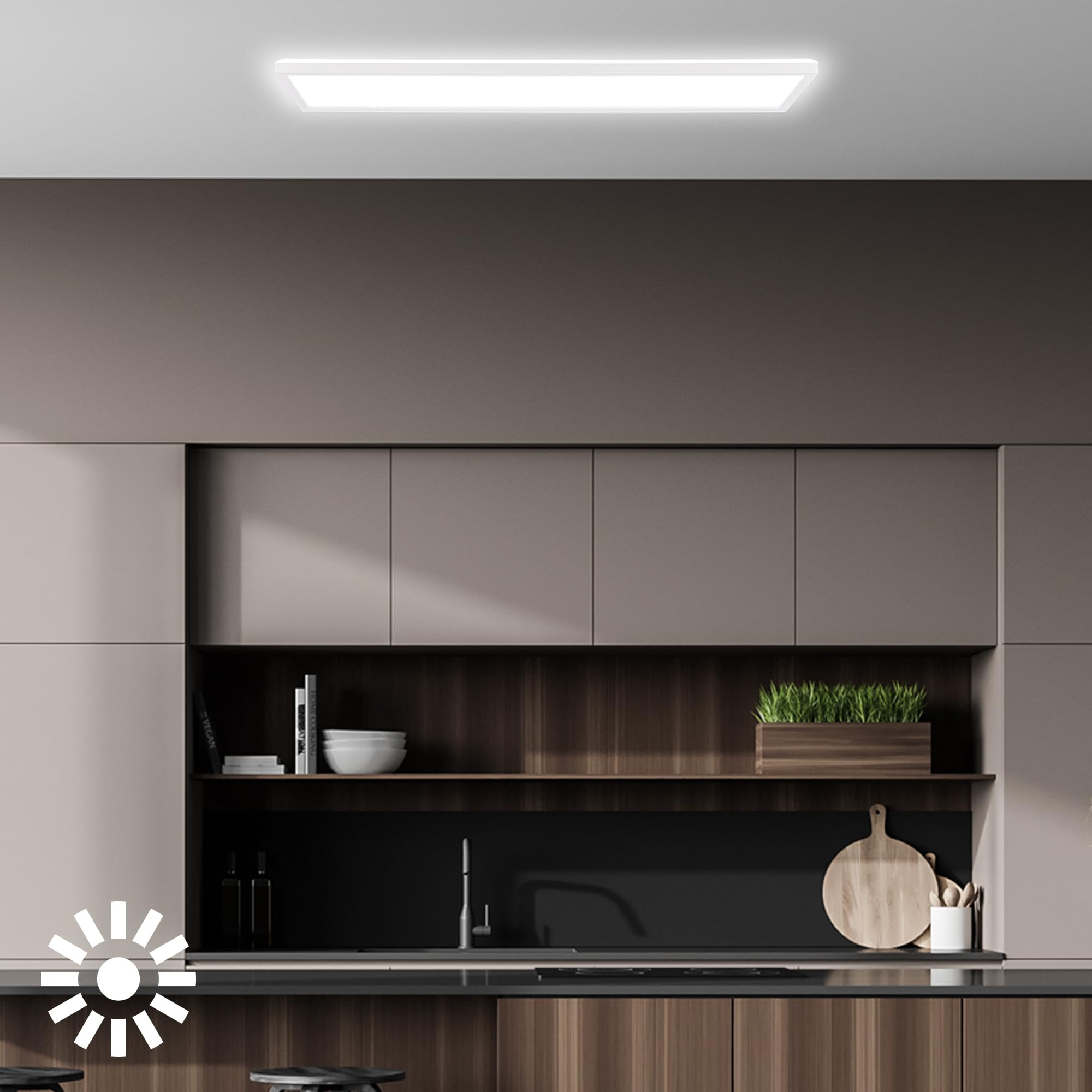Una cucina moderna con mobili marroni, dettagli in legno, un lavandino e una plafoniera luminosa.