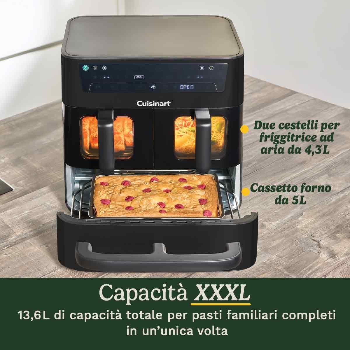Friggitrice ad aria Cuisinart nera con due cestelli superiori e un cassetto forno inferiore con una torta.