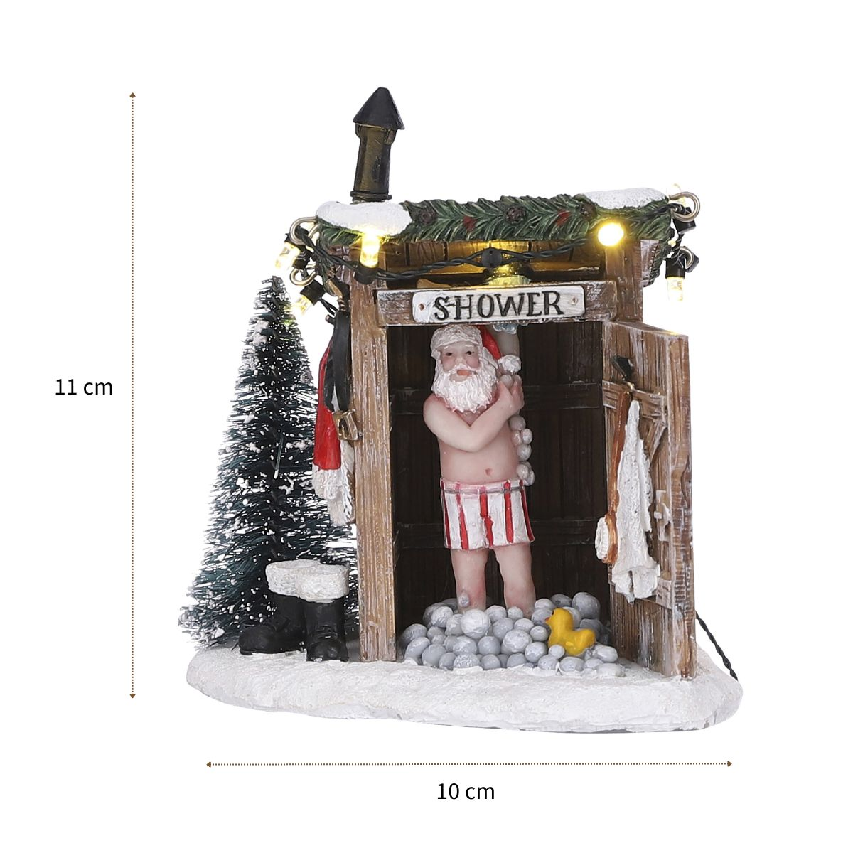 Santa Claus taking a shower in an illuminated wooden shed with snow, a Christmas tree, and a yellow duck.