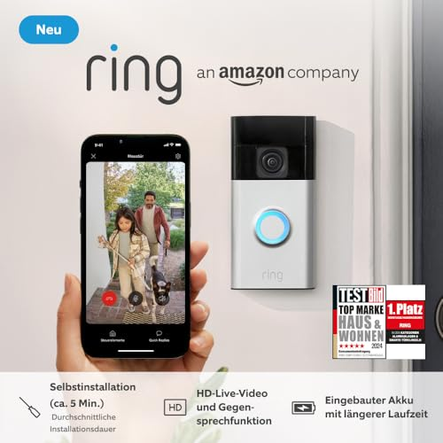 Ring Videotürklingel an einer Wand, bedient über eine Smartphone-App mit Live-Ansicht.
