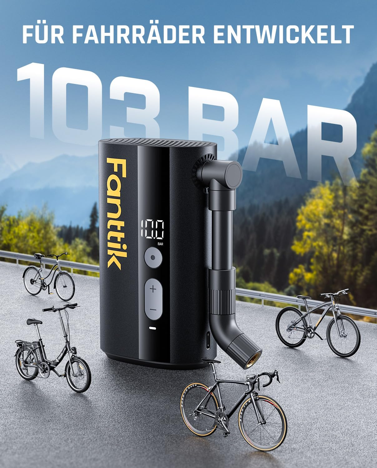 Pompe à air portable Fanttik noire sur asphalte, entourée de divers vélos avec un fond de montagne.