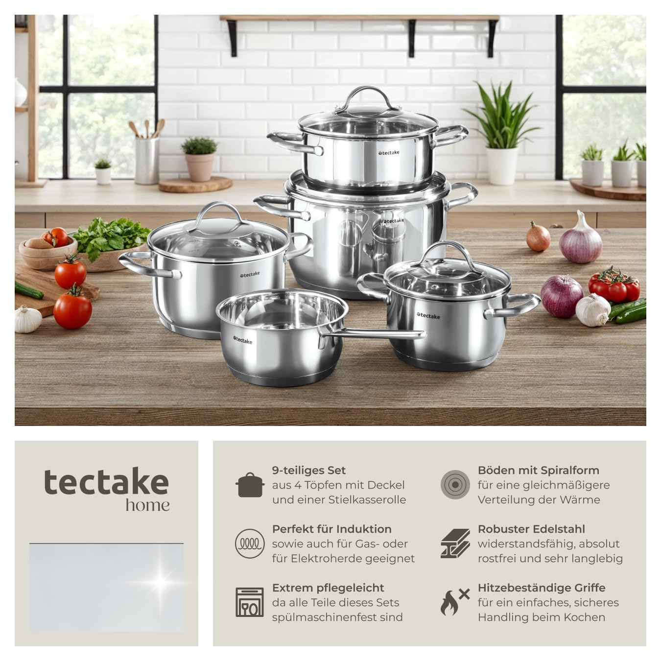 Set di pentole in acciaio inossidabile su tavolo in legno con ingredienti.