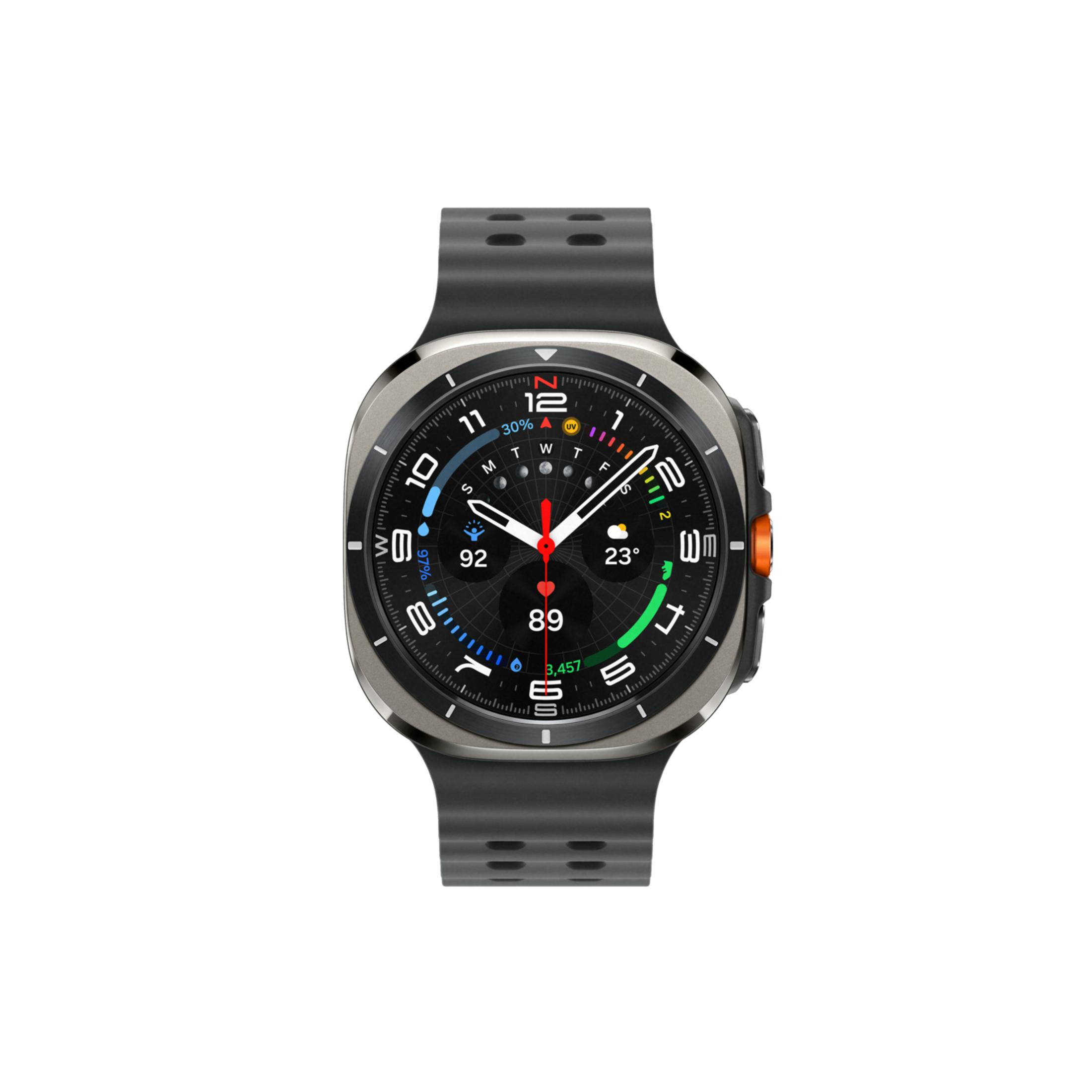 Uno smartwatch nero con display rotondo, indicatori della bussola e della data su un cinturino grigio.