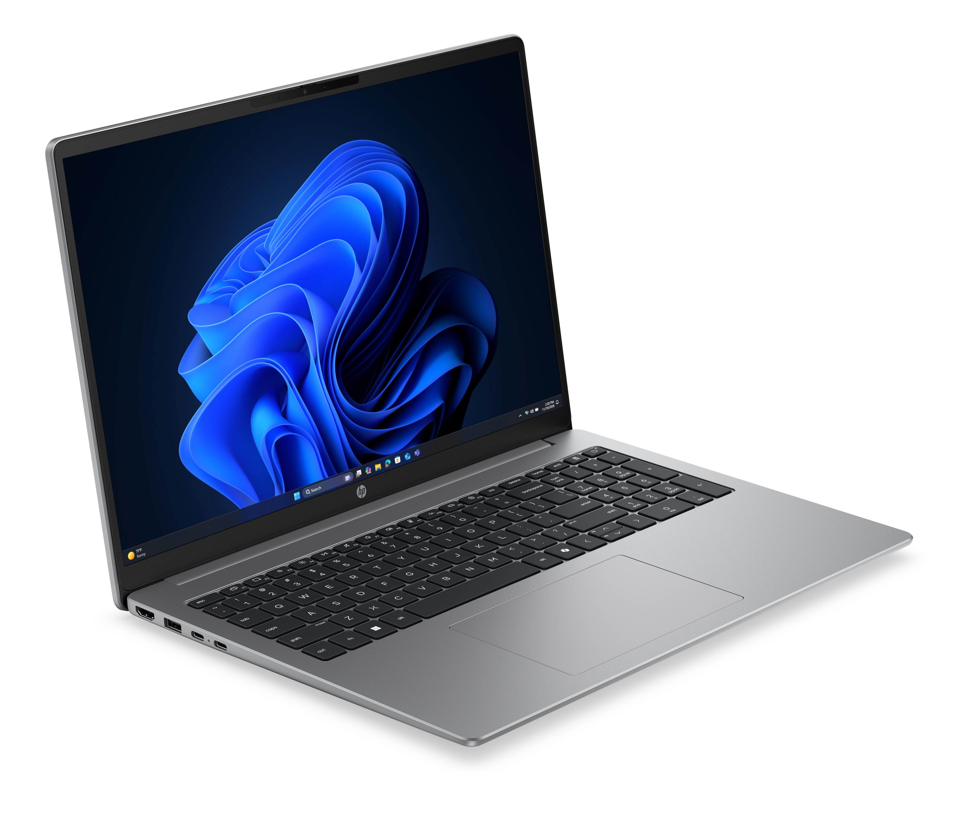 Un laptop argento con tastiera nera e sfondo blu sullo schermo, isolato su sfondo bianco.