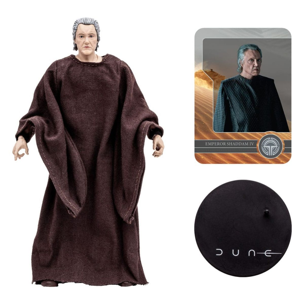 Eine Emperor Shaddam IV Actionfigur in brauner Robe, mit einer Charakterkarte und einem runden Dune-Sockel.