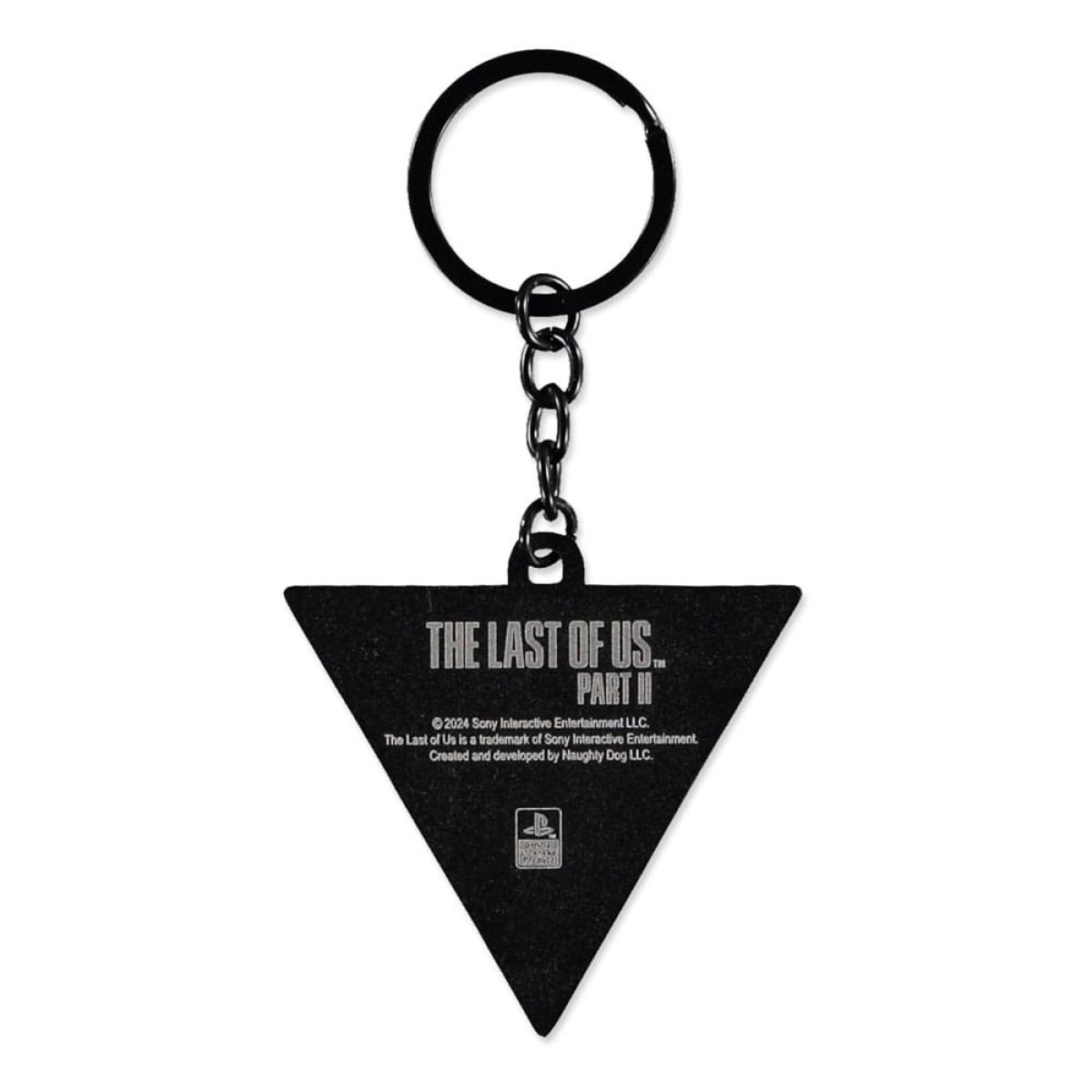 Llavero triangular negro con el logotipo blanco de The Last of Us Part II sobre fondo blanco.