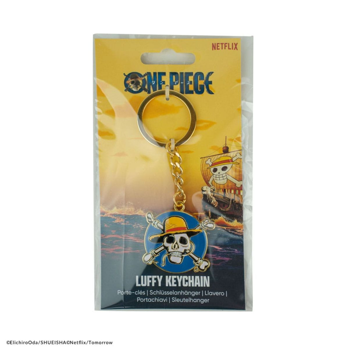 Llavero oficial de One Piece Luffy en empaque sin abrir con logotipo de calavera.