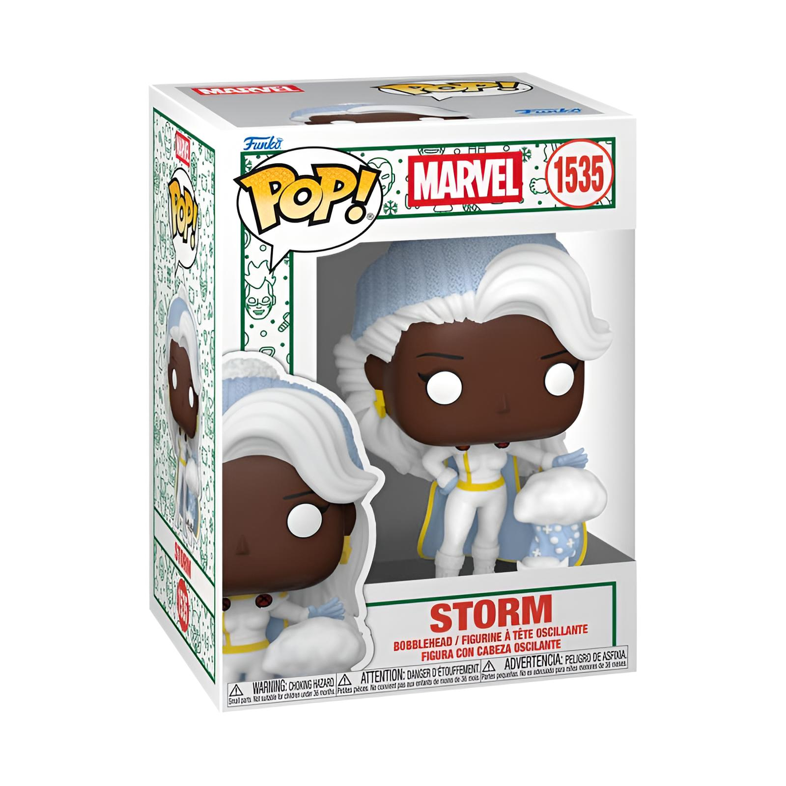 Figura de vinilo Marvel Storm Funko Pop dentro de una caja de coleccionista navideña.