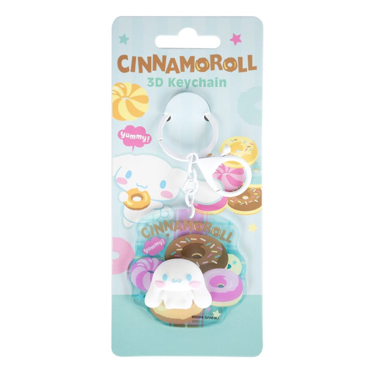 Llavero 3D de Cinnamoroll en su envase original con motivos de rosquillas.