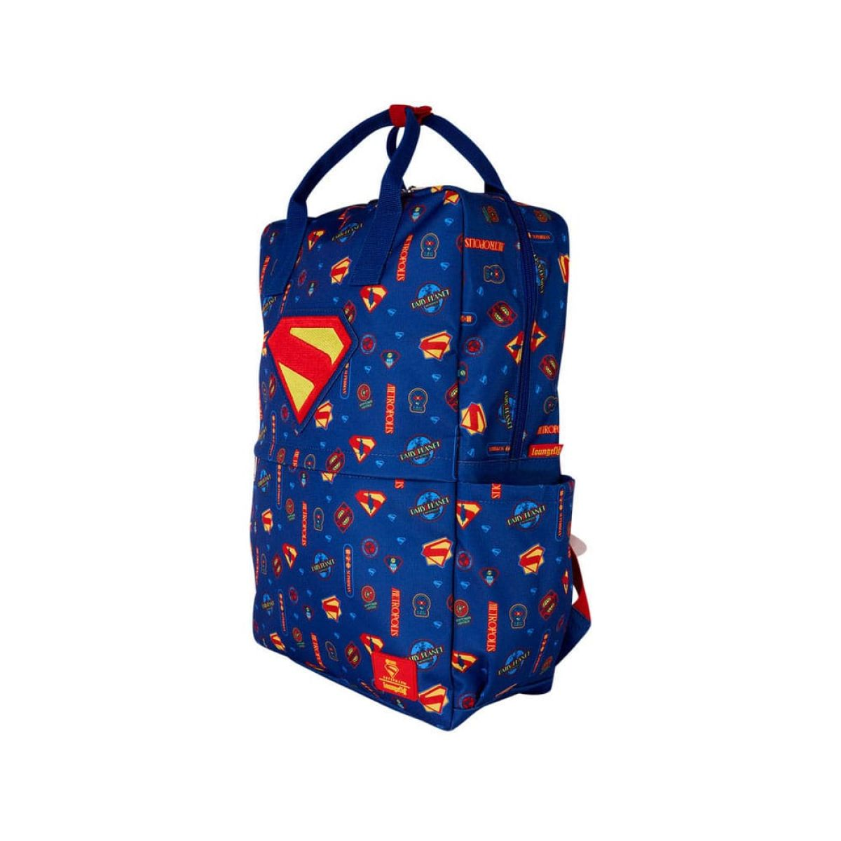 Una mochila azul de Superman con un logo amarillo y patrón sobre fondo blanco.