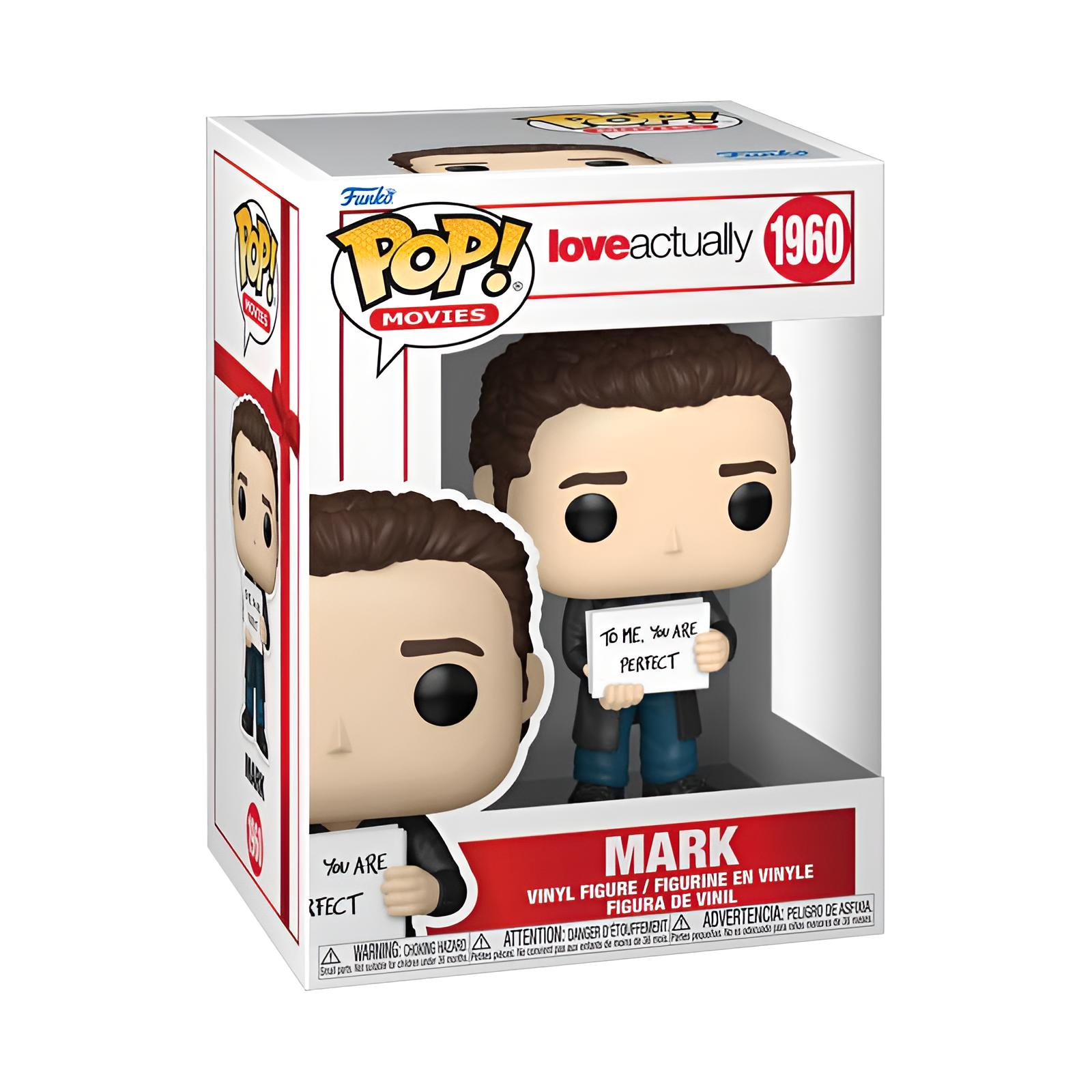 Una figura Funko Pop de Mark de Love Actually en su caja, sosteniendo un cartel que dice TO ME, YOU ARE PERFECT.