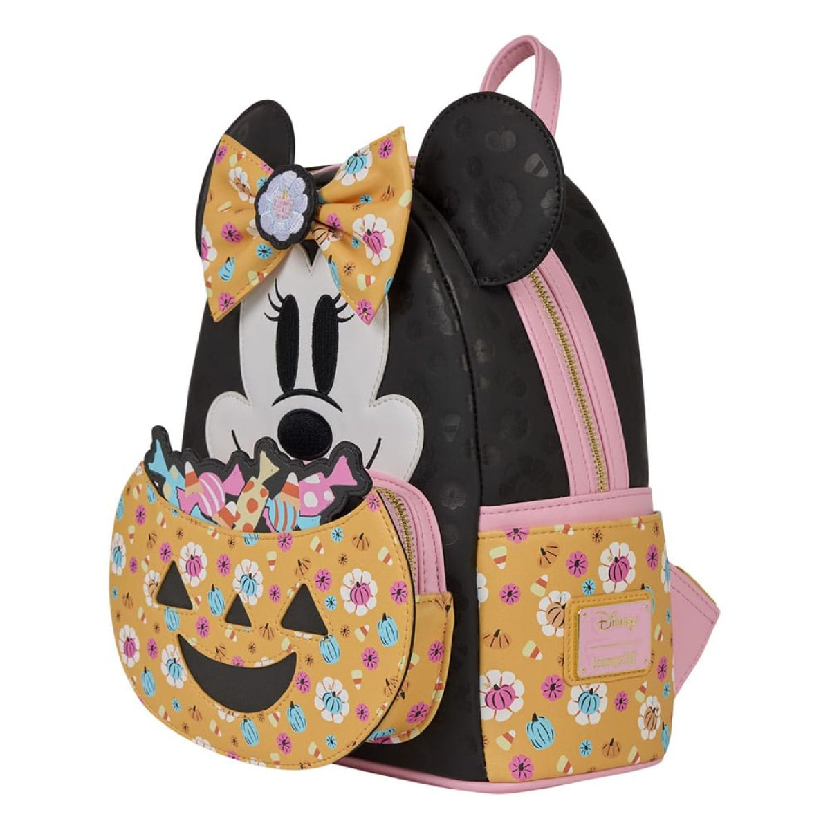 Mochila negra de Halloween de Minnie Mouse con un bolsillo de calabaza lleno de caramelos y un lazo floral.