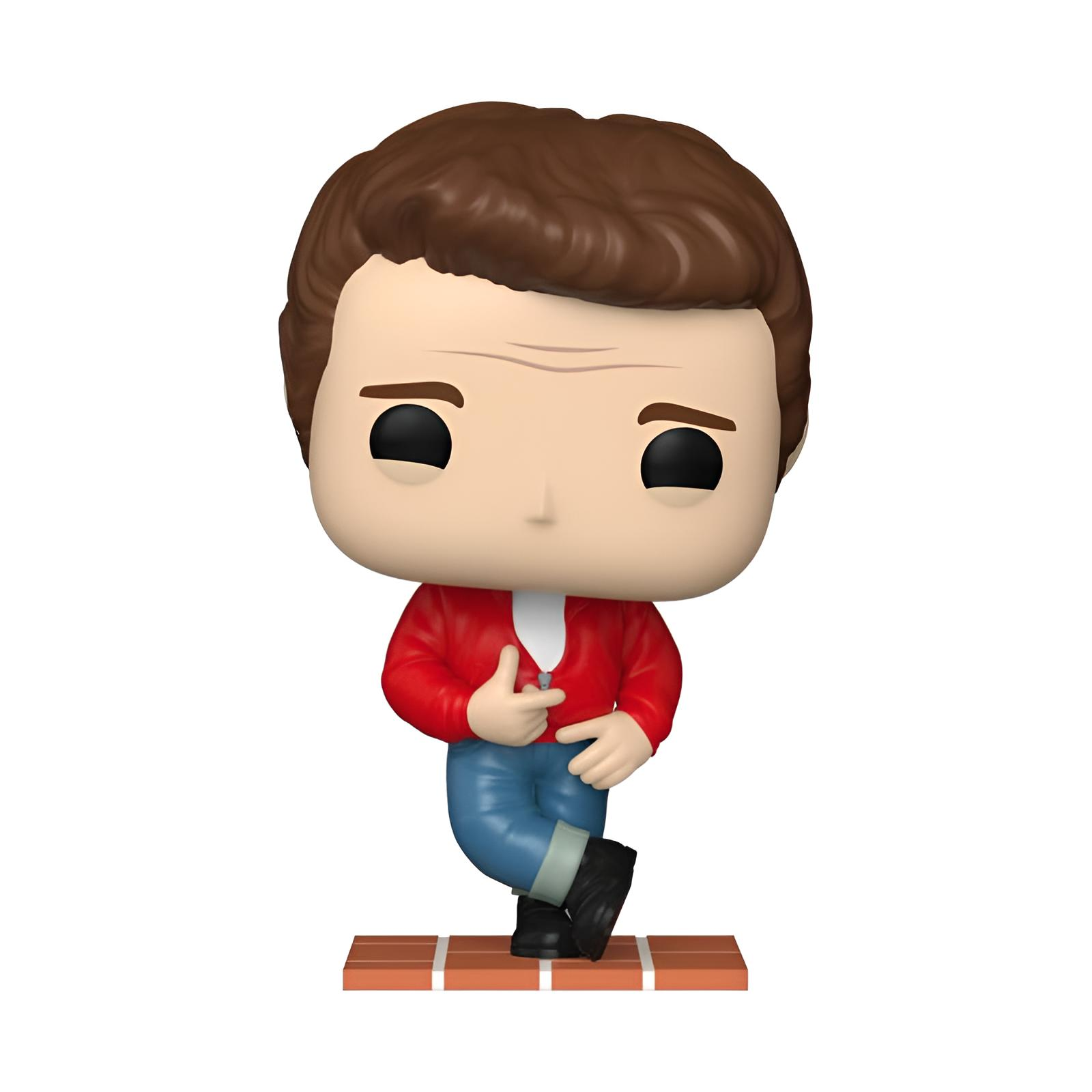 Una figura Funko Pop con pelo castaño, chaqueta roja y vaqueros azules sobre una plataforma de ladrillo rojo con fondo blanco.