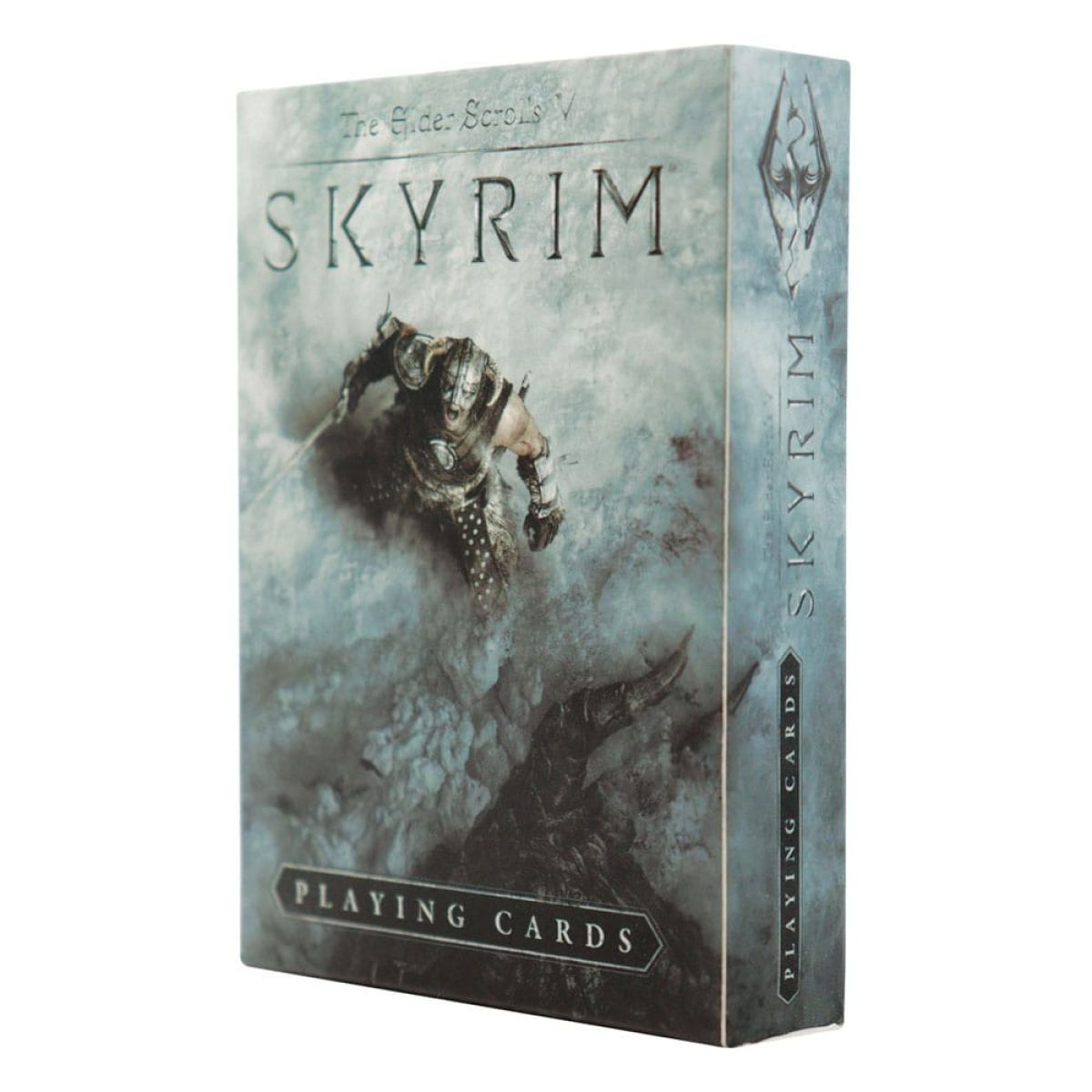 Une boîte de cartes à jouer Skyrim avec un guerrier en armure contre un dragon.