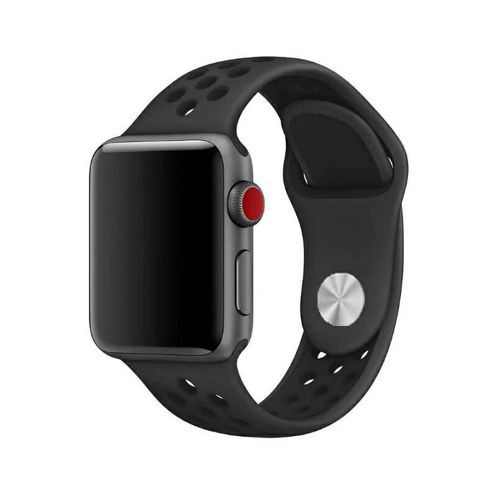 Un reloj inteligente negro con correa perforada y corona digital roja sobre fondo blanco.