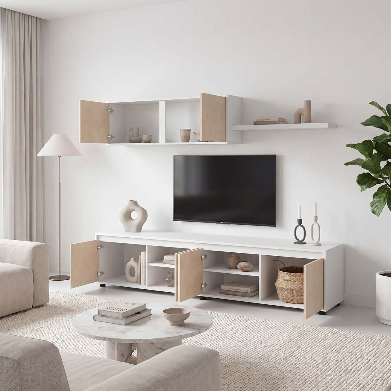 Sala con mueble de TV blanco, televisor, estante de pared y mesa de centro redonda sobre alfombra blanca.