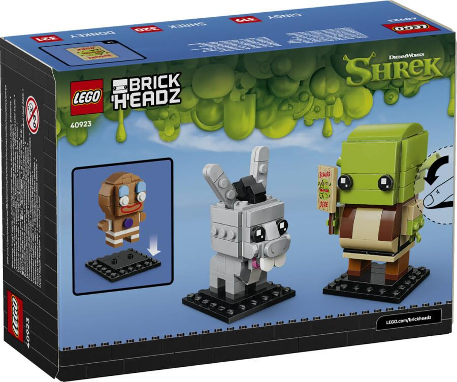 Gingy, Eşek ve Shrek'in inşa edilmiş figürlerini gösteren bir LEGO BrickHeadz Shrek kutusunun arkası.