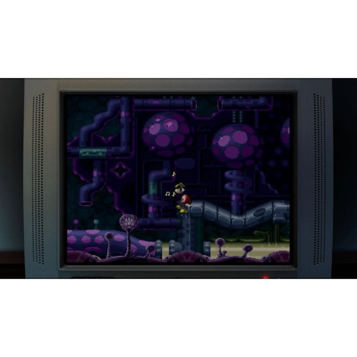 Ein Pixel-Spiel wird auf einem alten Fernseher mit violetten und blauen Tönen gezeigt.