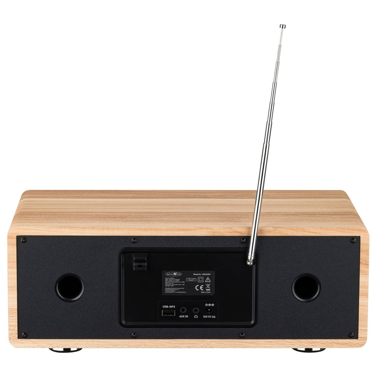 Die Rückseite eines Holzdickfunkgeräts mit Antenne, Anschlüssen und zwei runden Öffnungen.