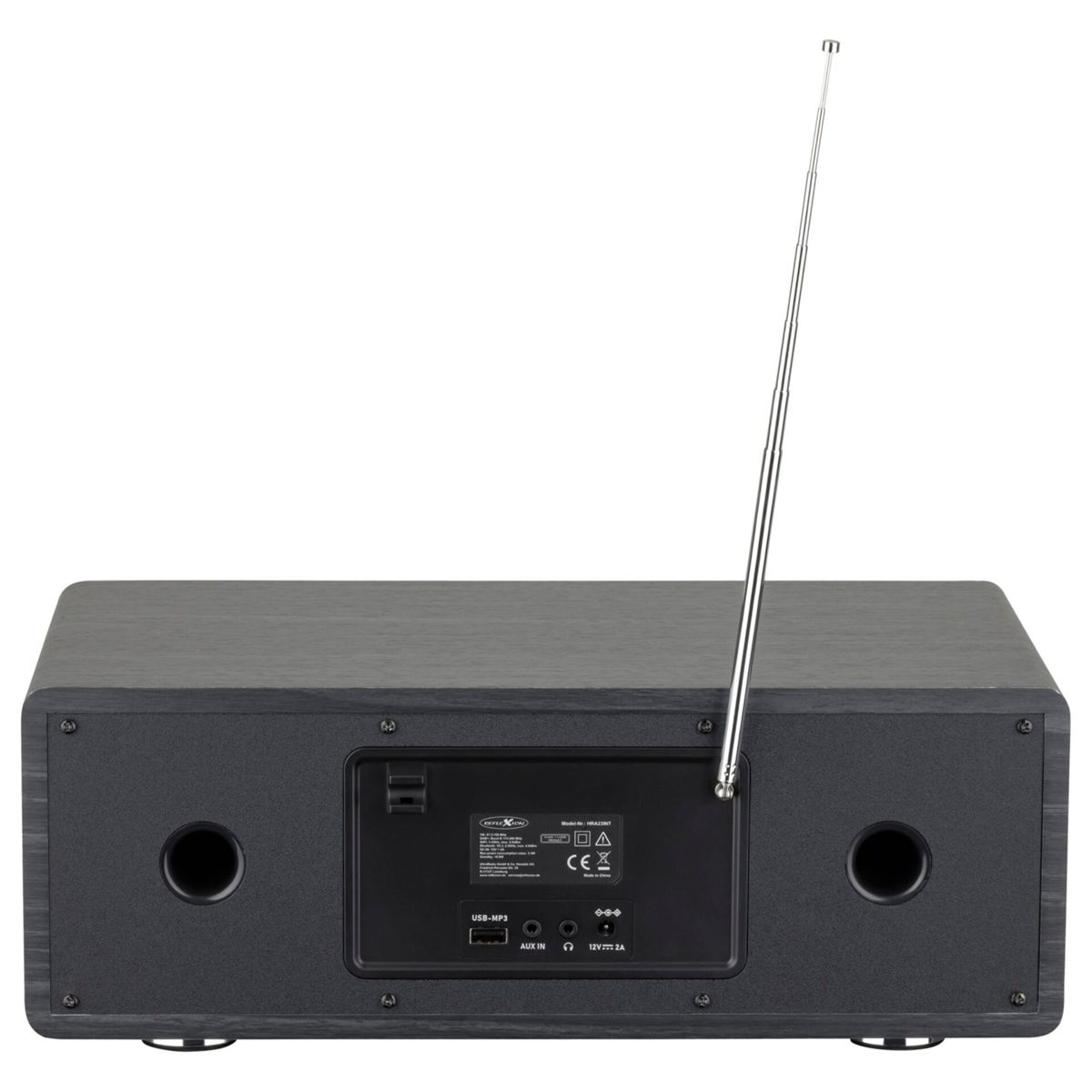 Die Rückseite eines dunklen Holzradios mit ausgefahrener Antenne, Anschlüssen und zwei runden Lautsprecheröffnungen.
