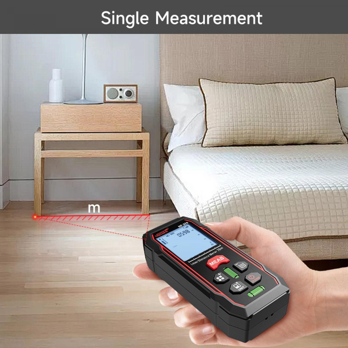 Hand hält rotes Lasermessgerät, das den Abstand zu einem Nachttisch misst.