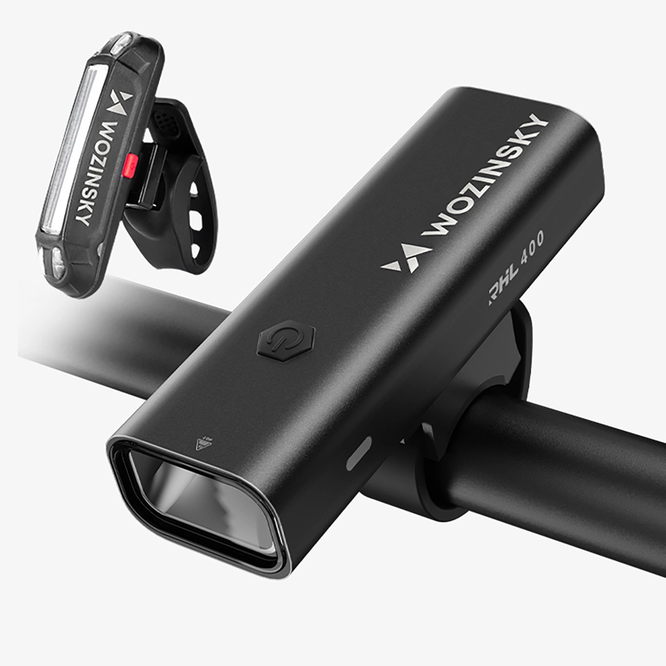 Schwarze Wozinsky RHL 400 Fahrradlampe am Lenker mit separatem kleineren Zusatzlicht.