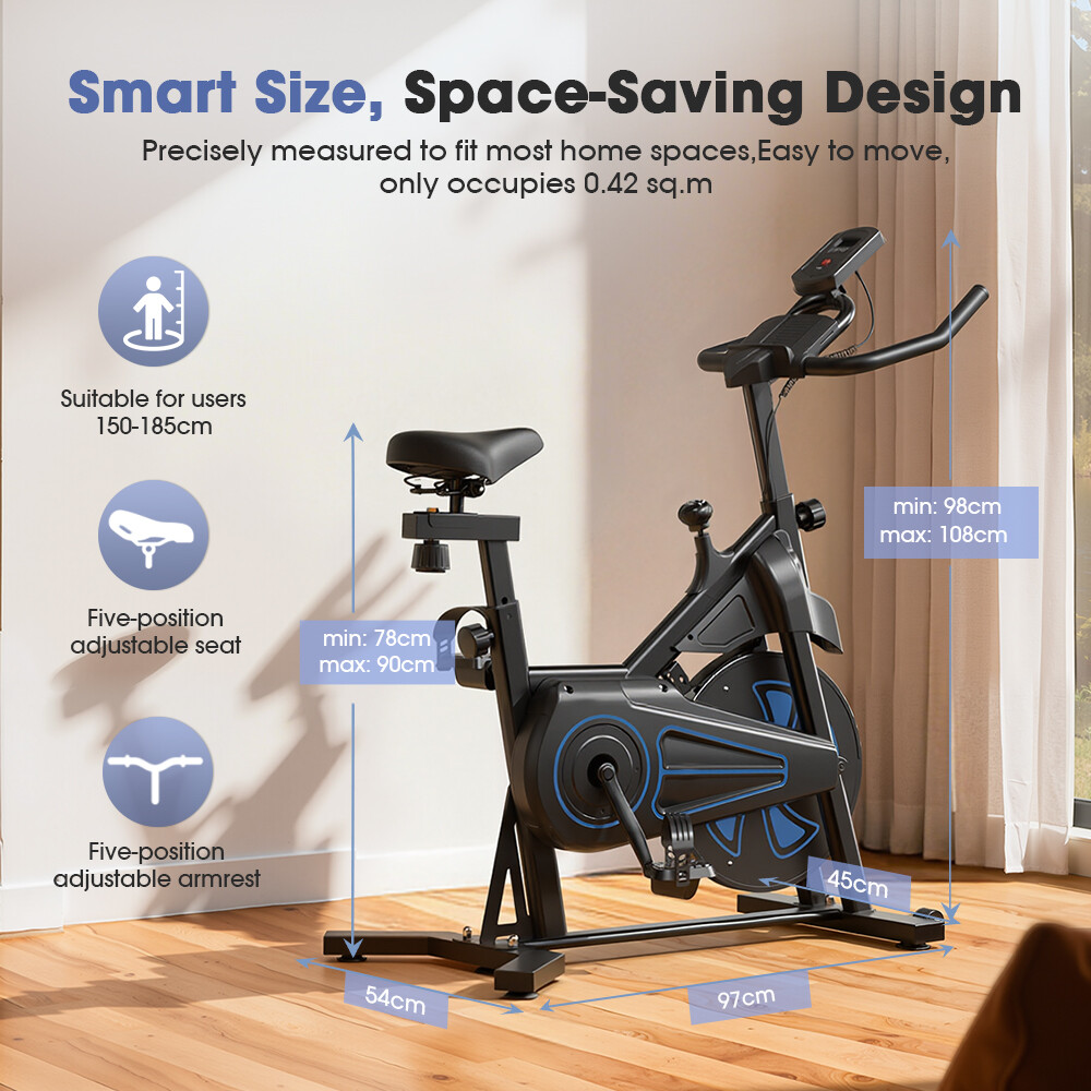 Una bicicleta estática negra sobre suelo de madera con medidas y características.