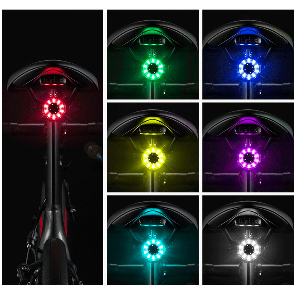 Fahrradsattel mit rundem LED-Rücklicht, das in Rot, Grün, Blau, Gelb, Lila, Cyan und Weiß leuchtet.