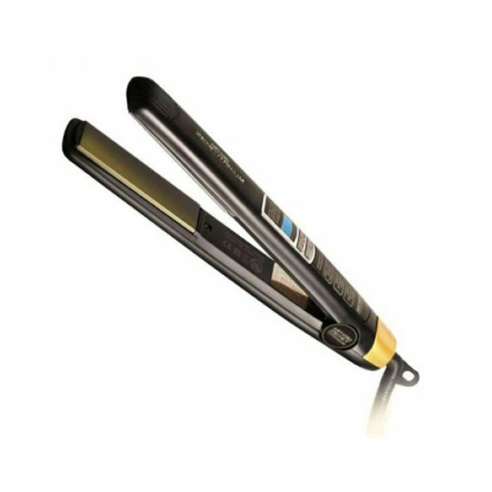 Una piastra per capelli nera e dorata lucida in posizione diagonale su sfondo bianco.