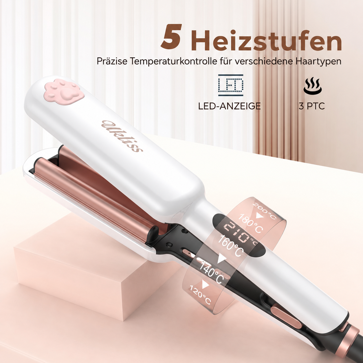 Weißer Haargräter mit rosé-goldenen Akzenten und Temperaturanzeige auf einem Tisch.