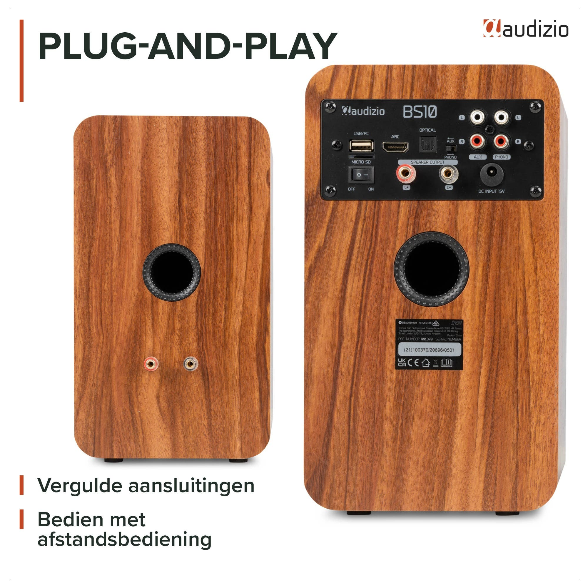 Altavoces Audizio BS10 con acabado de madera y varios puertos de conexión en la parte posterior.
