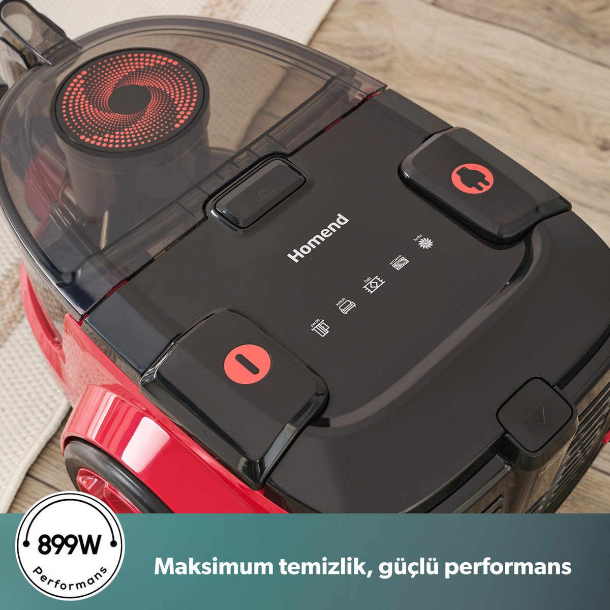 Ahşap zeminde kırmızı ve siyah Homend elektrikli süpürge ve metin.